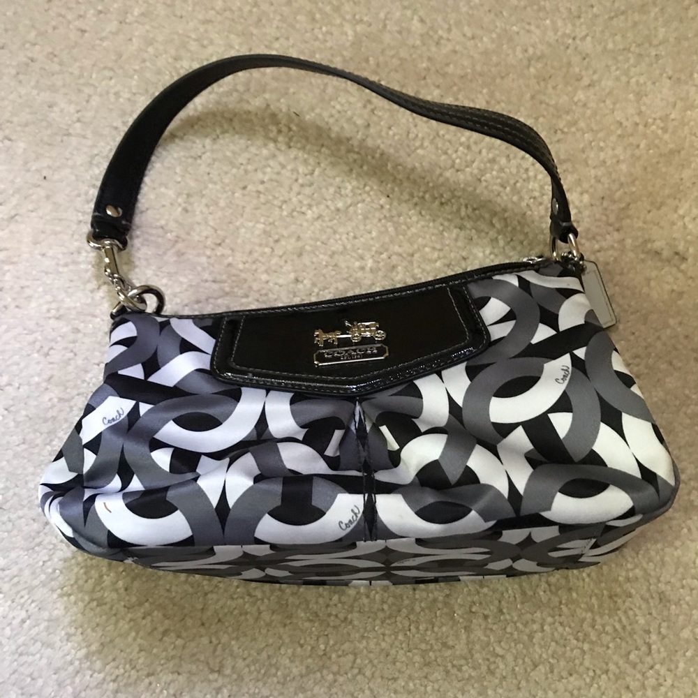 Black, White, and Grey Coach Purse